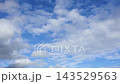 Textured clouds are flying across the blue sky. Timelapse. 143529563