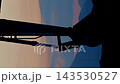 [Time-lapse night view] The changing appearance of an excavator along with the sunset (Vertical 01) 143530527