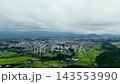 Aerial footage of rice paddies and rural settlements in Kobayashi City, Miyazaki Prefecture. 143553990