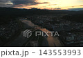 Aerial footage of the Kuma River and urban area in Hitoyoshi City, Kumamoto Prefecture. 143553993
