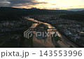 Aerial view of the Kuma River and city center in Hitoyoshi City, Kumamoto Prefecture, at sunset. 143553996