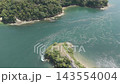 Aerial footage of Noshima Island and tidal currents in Imabari City, Ehime Prefecture. 143554004