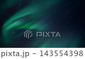 Green aurora borealis ribbons drifting across starry night sky with sweeping curved shapes and soft emerald glow, tranquil celestial panorama over dark horizon, ethereal motion scene 143554398