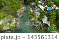 Traditional fishing boats floating over Bogac Cold Spring in Surigao del Sur. Philippines. 143561314