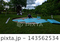 Preparation of a pool foundation in a backyard with foam panels and tools 143562534