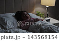 preschool child girl sleeping on a bed and sweet dream at night 143568154