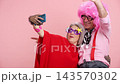 Elderly funny couple taking a selfie with a smartphone 143570302