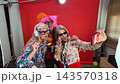 Eccentric senior friends having fun taking selfies 143570318