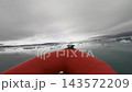 Floating melting icebergs in Jokulsarlon lagoon, Iceland view from a speed boat 143572209