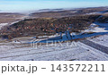 Aerial view of mountain village at winter by drone 143572211