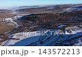Aerial view of mountain village at winter by drone 143572213