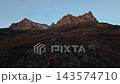 Forward camera movement over rocky mountain slope 143574710