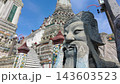 BANGKOK, THAILAND - 6th OCTOBER 2024: Close static clip of Buddha statue with  defocused Thonburi Pagoda of Wat Arun in Bangkok Thailand behind 143603523