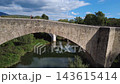 Medieval stone bridge of Besalu in La Garrotxa Girona Catalonia Spain Medieval stone bridge of Besalu in La Garrotxa Girona Catalonia Spain 143615414