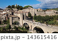 Medieval stone bridge of Besalu in La Garrotxa Girona Catalonia Spain Medieval stone bridge of Besalu in La Garrotxa Girona Catalonia Spain 143615416