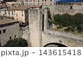 Medieval stone bridge of Besalu in La Garrotxa Girona Catalonia Spain Medieval stone bridge of Besalu in La Garrotxa Girona Catalonia Spain 143615418