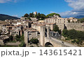 Medieval stone bridge of Besalu in La Garrotxa Girona Catalonia Spain Medieval stone bridge of Besalu in La Garrotxa Girona Catalonia Spain 143615421