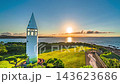 [Kanagawa Prefecture, Miura City] Sunrise at Jogashima Park: Awazaki Lighthouse and the view of the cape as the sun rises - Time lapse - pan left 143623686
