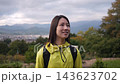 A female hiker enjoying the view of the Shibusawa Hills. 143623702