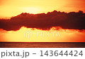Burning sky, sunrise over sea. 143644424