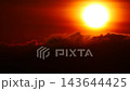 Burning sun at sunrise and dark clouds. 143644425
