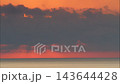 Sun Rising Over Sea 143644428