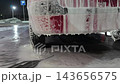 A car is being cleaned at a car wash, covered in soap and water. The automated process sprays and rinses, leaving the vehicle sparkling and fresh. 143656575