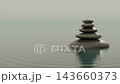 Zen stones piled on the calm, misty surface of the water, creating ripples from the droplets. A background image of healing and balance. Looping video. 143660373