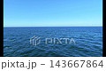 Blue Ocean Under Clear Sunny Sky 4K 143667864