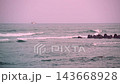Ocean Waves and Fishing Boat at Dusk in Toucheng, Taiwan 143668928
