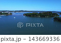 Aerial footage captures the beautiful scenery of Matsushima, one of Japan's three most scenic spots, including the islands floating in the bay, sightseeing boats, and the red bridge, showcasing Miyagi's famous tourist attractions. 143669336