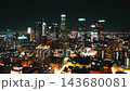 Los Angeles skyline at night with illuminated skyscrapers and urban landscape views 143680081