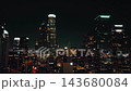 Nighttime cityscape view of downtown Los Angeles with illuminated skyscrapers and vibrant city lights 143680084