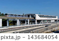 Osaka Monorail 2000 series arriving at Shibahara-Handai-mae Station 143684054