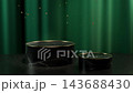 A luxurious display featuring an emerald velvet curtain and a black marble base with gold trim, adorned with floating golden orbs. (Looping video) 143688430
