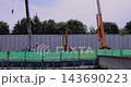 Construction site crane [Construction image] 143690223