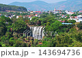 Panorama landscape with Elephant Waterfall near Dalat in Vietnam. Famous Vietnamese tourist attraction is waterfall Thac Voi 143694736