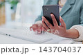 Computer keyboard, phone and business person hands typing online research report, copy mobile info or review. Closeup, smartphone data and professional employee working on cellphone application notes 143704037