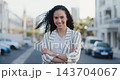 Arms crossed, business and face with woman in city for corporate, mission and development. Smile, confidence and pride with portrait of female employee in outdoors for mindset, focus and happiness 143704067