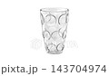 Empty drinking glass with circles on white background 143704974