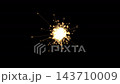 Glowing glitter sparkles and light rays on plain black background 143710009