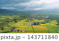 Aerial view of agriculture in rice fields and village, Taiwan. 143711840