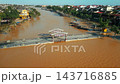 flooded city or town with buildings submerged in water, underwater village after heavy tropical rain and typhoon, An Hoi lantern bridge in Vietnam, climate change and global warming impact 4k 143716885