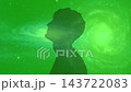 Silhouette of young man dreaming with green galaxy background in cosmos 143722083