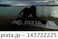 Yoga by the Water Finding Serenity in Stretching Under the Open Sky and Natures Beauty 143722225