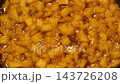 Cooking apple in a frying pan. Fried apples with honey sugar, fall side dish. Glazed cinnamon Apple Fritter Skillet. Caramel. Homemade autumn sweet dessert. Ingredients for crumble, tart, crisp or pie 143726208