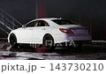Car parked in a parking lot 143730210