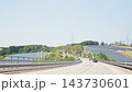 Highway through a solar panel farm slow motion view from a moving car 143730601