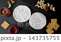 Brie or Camembert cheese is a white, round shape for baking and melting. Camembert cheese 143735755