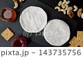 Brie or Camembert cheese is a white, round shape for baking and melting. Camembert cheese 143735756